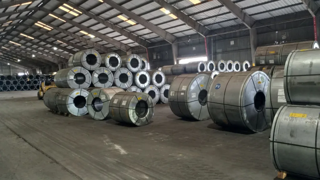 cargo_services_04 Large industrial rotors securely stored indoors, aligned side by side, awaiting inspection for a Cargo Condition Survey. Ensuring proper handling and storage to prevent damage during transport, following Zeus Marine's comprehensive cargo condition assessment process.
