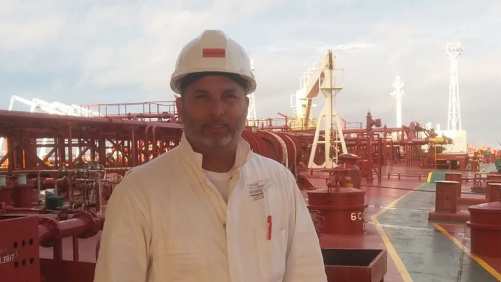 Marine surveyor conducting a vessel pre-vetting inspection onboard.